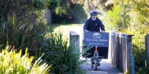 The Invy Baker delivering bread on a bike